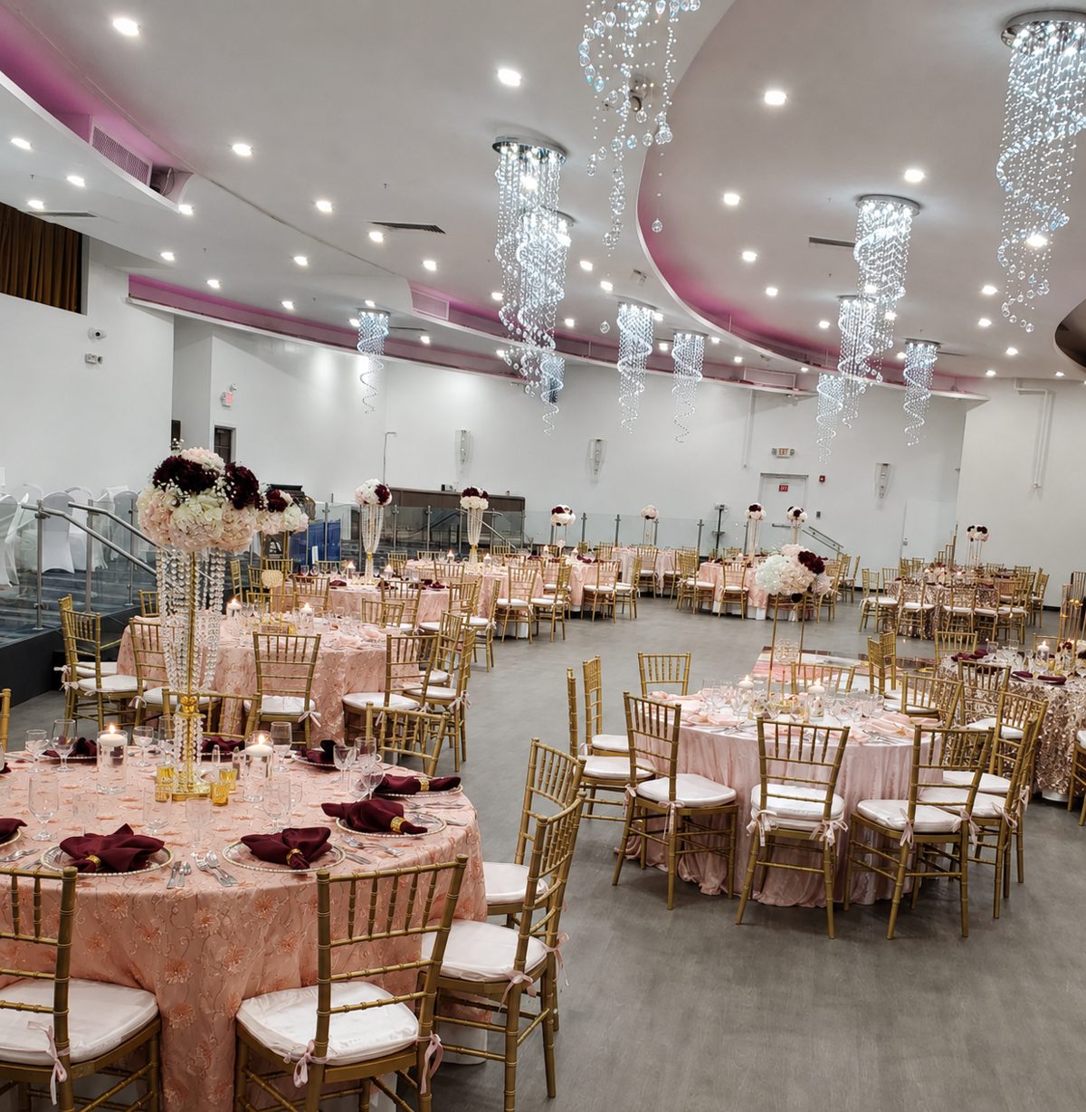 Blush ballroom with gold chiavari chairs